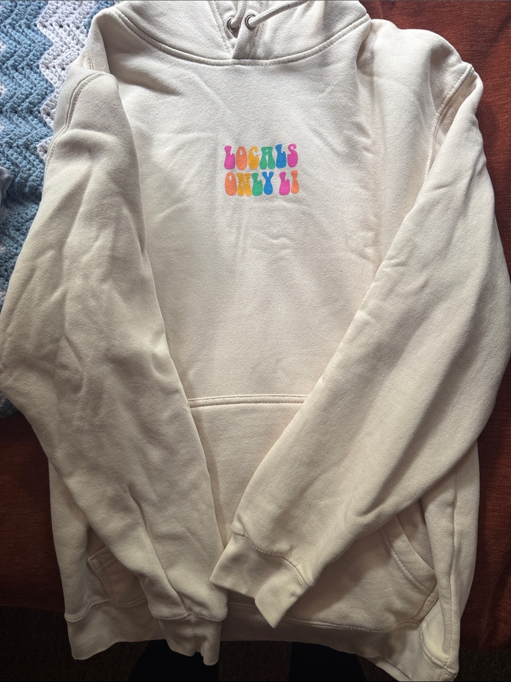 Cream Hoodie with Colorful 'LOCALS ONLY' Chest Graphic